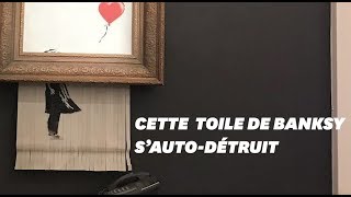 Ce tableau de Banksy s’autodétruit en pleine vente aux enchères [upl. by Urbannal]